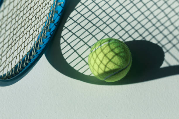 istock tennis racket and ball on the floor 688468020