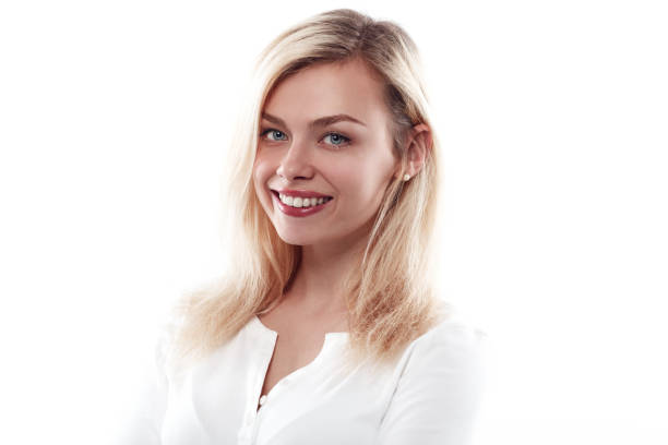 istock Beautiful woman smiling face close up studio on white. 688468682