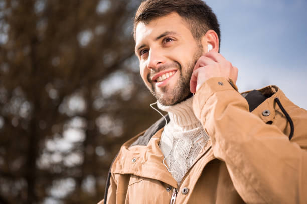 istock Handsome young man in earphones 688468946