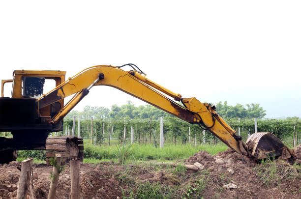 istock Backhoe was digging a pit in the ground. Crawler excavator truck. 688472104