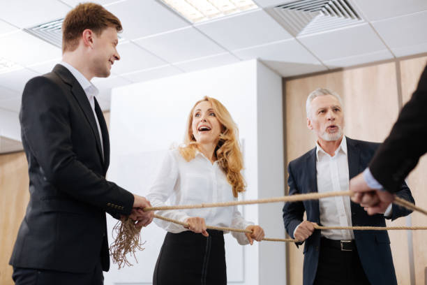 istock Pleasant delighted colleagues looking at each other 688472428