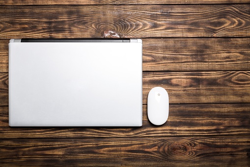 Laptop computer and mouse. Isolated  background