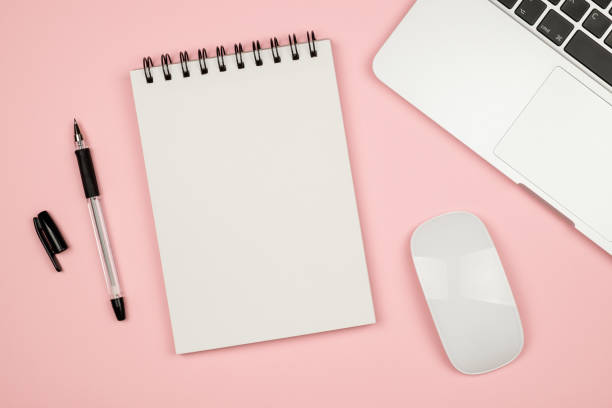 istock Creative design mockup set of workspace desk with notebook. Copy space colored background 688476464
