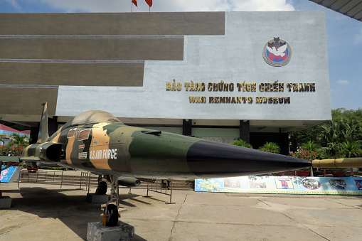 the War Remnants Museum, in Saigon, a war museum relating to the American Vietnam and French Indochina Wars, with a captured US Air Force fighter jet on exhibit in its courtyard