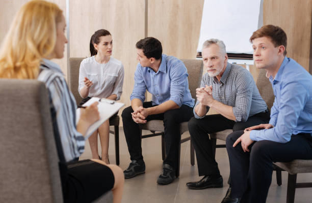 istock Nice pleasant people looking at their psychologist 688489014