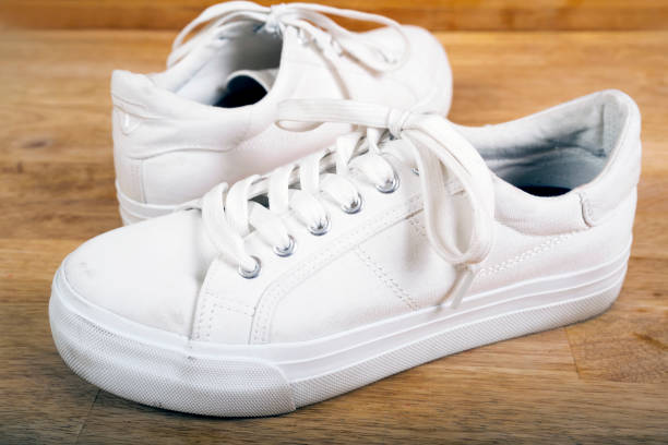 istock Pair of white sneakers with laces 688494552