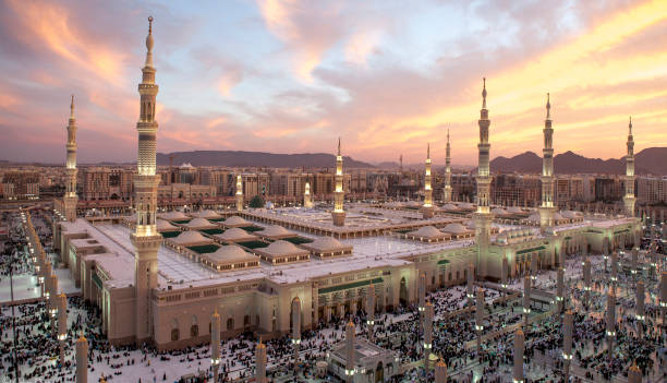 Al-Masjid Al-Nabawi Sunset at Al-Masjid An-Nabawi mosque photos stock pictures, royalty-free photos & images