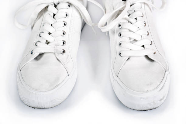 istock Pair of white sneakers with laces 688494902