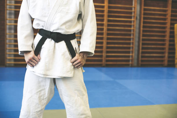 istock Young male practicing judo in kimono. 688495314