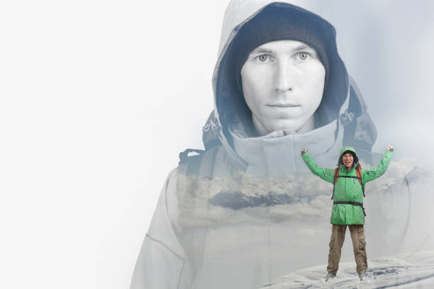 istock Double exposure effect photography. Hiker man in snowy winter mountain 688498458