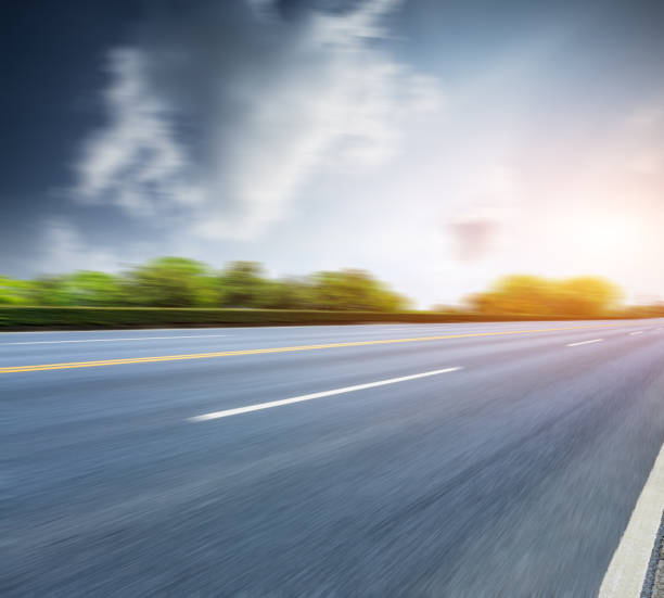 istock Country asphalt road,Motion blurred road background 688515828