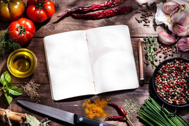 istock Blank cookbook with fresh ingredients for cooking and seasoning 688530252