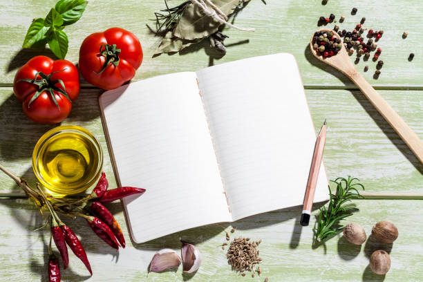 istock Blank cookbook with fresh ingredients for cooking and seasoning 688530502