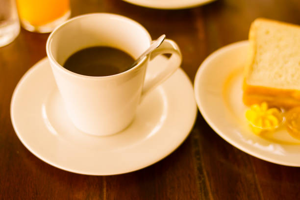 istock coffee and breakfast set on wooden table,vintage style 688530606