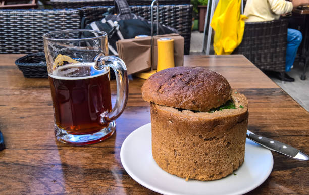 Soup in bread bowl and mug of beer, Riga, Latvia