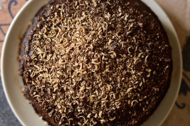 istock Fresh chocolate cake on white plate shot from above 688530918