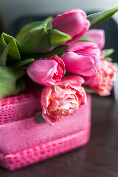 istock Pink tulips and pearl  jewelry box 688531310