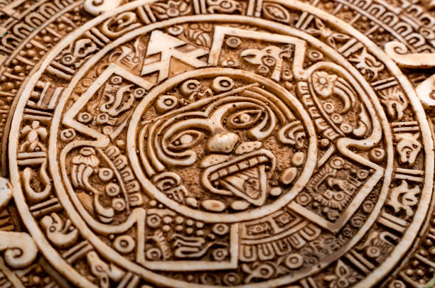 Macro close up on Mayan calendar Archeological Aztec Sun Calendar. The Aztec calendar stone was made by inhabitants of modern day Mexico aztec civilization photos stock pictures, royalty-free photos & images