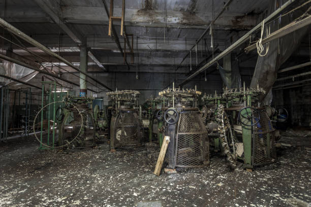 istock Giant yarn spinners in an abandoned factory 688540570