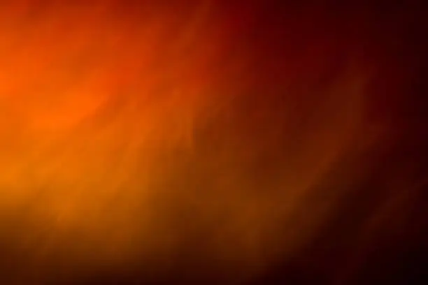 Photo of Abstract smoke background color on yellow, orange and red colours.