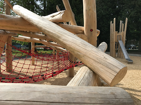 Children's adventure playground mostly made of clean wooden logs