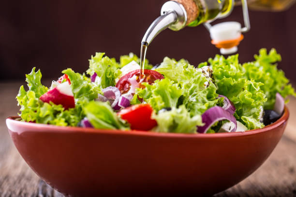 istock Salad. Vegetable salad. Spring vegetable salad.Fresh vegetable salad with tomatoes onion cheese and olives 688555302