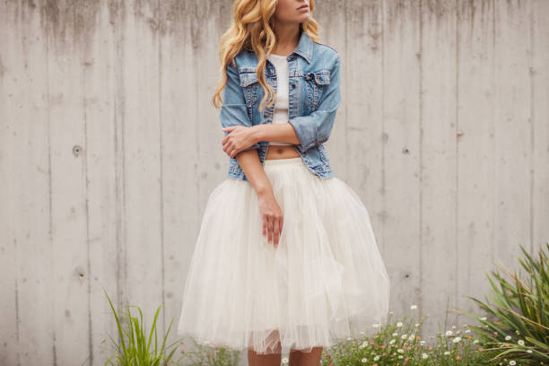 young beautiful woman outdoors - skirt imagens e fotografias de stock