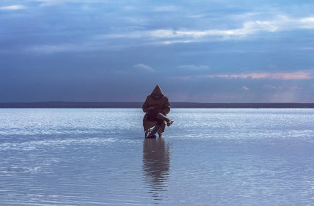 istock Lonely man in the lake 688567736