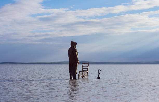 istock Lonely man in the lake 688567824