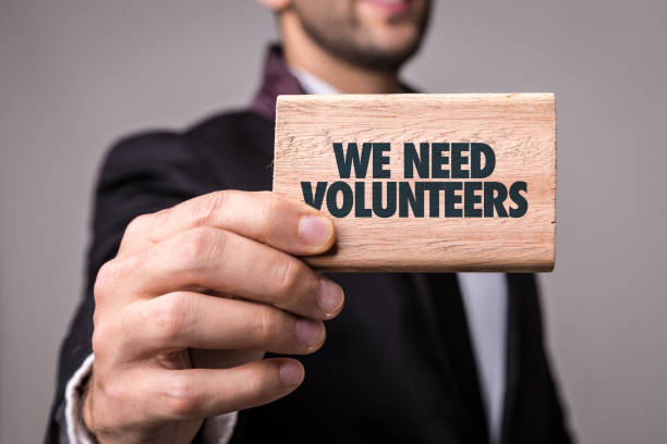 We Need Volunteers We Need Volunteers sign contributor stock pictures, royalty-free photos & images
