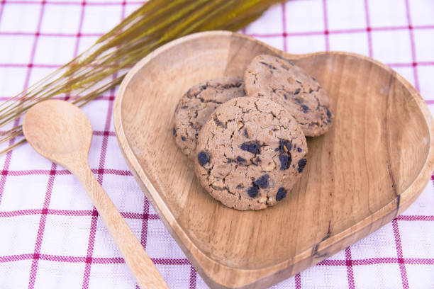 istock Chocolate chip cookies on background of brown. 688570974
