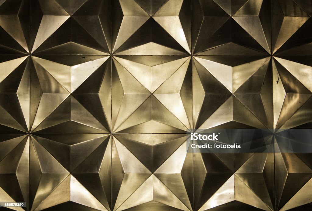 Metal golden wall Decorative metal wall, building and architecture Gold - Metal Stock Photo