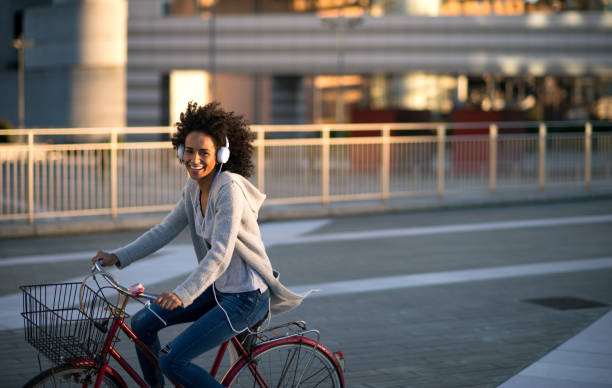 istock She loves to ride a bicycle. 688579734