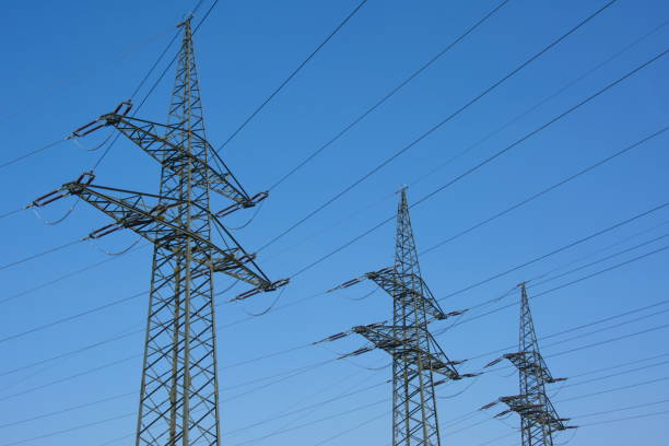 Electricity pylons blue sky Energy Background