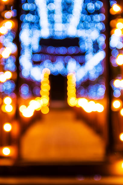 istock Abstract bokeh of wood bridge and light bulb 688580242