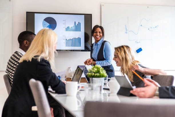 istock Cheerful business team in the office 688588118