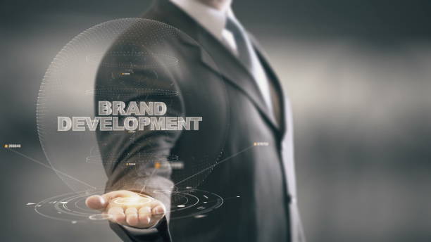 istock Brand Development with hologram businessman concept 688593820