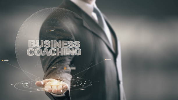 istock Business Coaching with hologram businessman concept 688594010