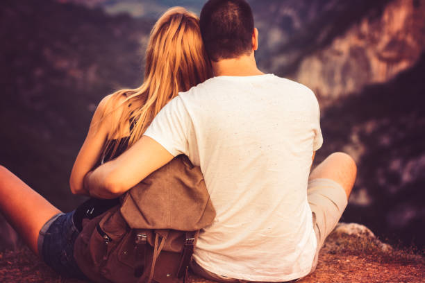 istock Beautiful couple cuddle in the mountain 688594646