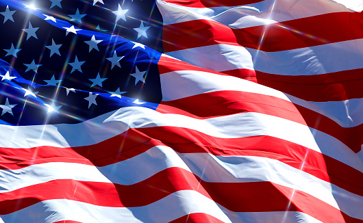 Closeup picture of the flag of the USA with sparkles