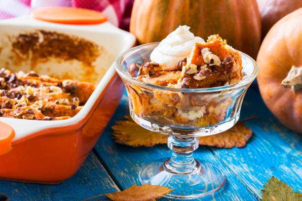 istock Pumpkin bread pudding topped with whipped cream 688595636