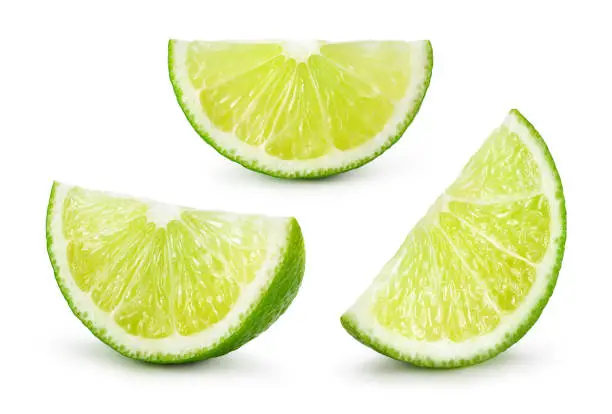 Photo of Lime. Fresh fruit isolated on white background. Slice, piece, quarter; part, segment, section. Collection.
