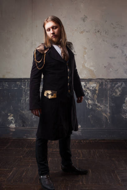 Handsome Male Steam Punk Retro Man In Uniform Portrait Over Grunge