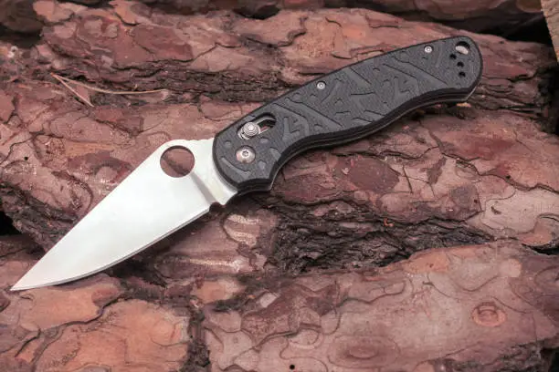 Photo of A unique knife with a hole in the blade.