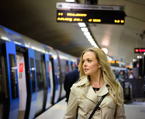 istock Blonde Swedish woman, commuter subway train 688663236
