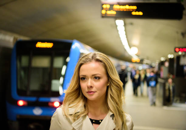istock Blonde Swedish woman, commuter subway train 688664806