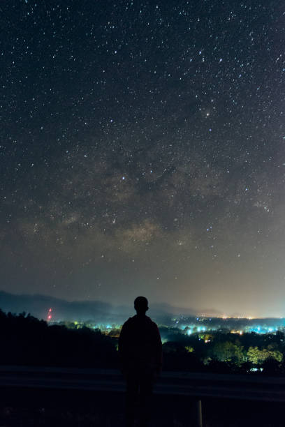 istock A man looking at the milky way 688665320