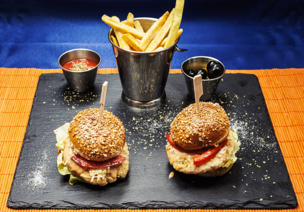 istock Two Burgers and Fries 688718510
