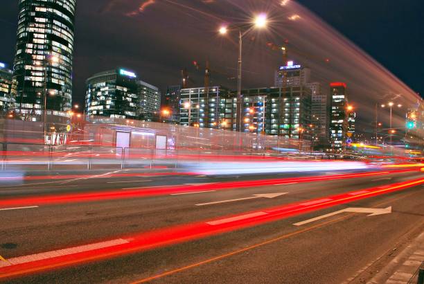 istock The light trails on the modern building background 688718778