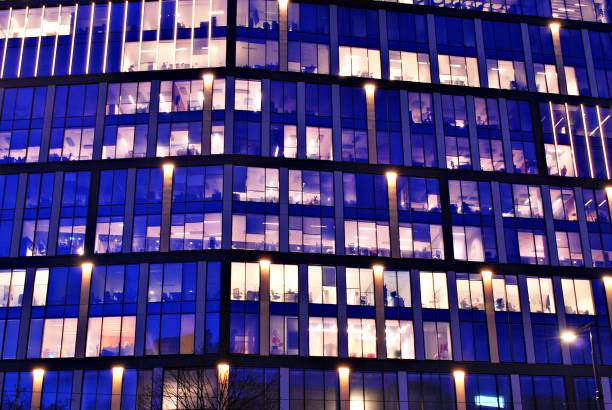istock The light trails on the modern building background 688724018